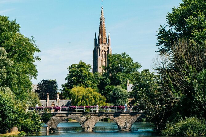 2-Hour Historical Walking Tour in Bruges with Praline Included - Canal views, De Halve Maan, and Bruges’ darker corners