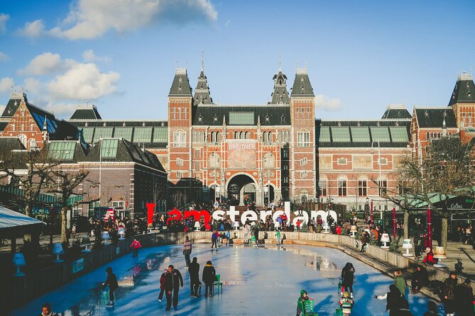 Amsterdam Day Trip from Brussels With Cheese, Clogs and Windmills - Guides, languages, and group size