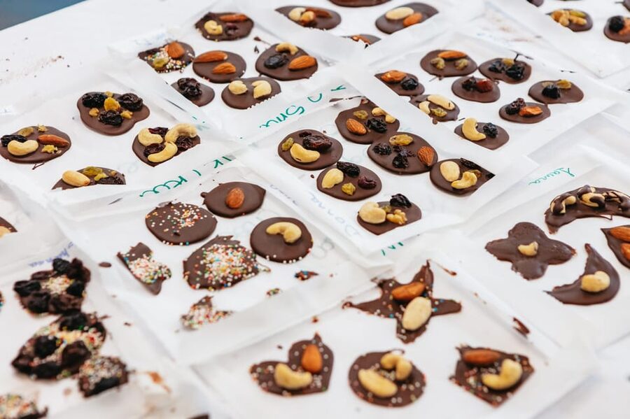 Bruges: Belgian Praline and Mendiants Chocolate Workshop - Building praline shells and creamy filling