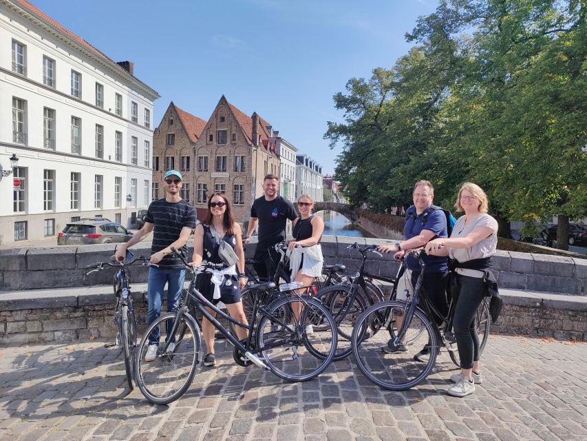 Bruges by bike with family and friends! - Market Square, Burg Square, and the first canals