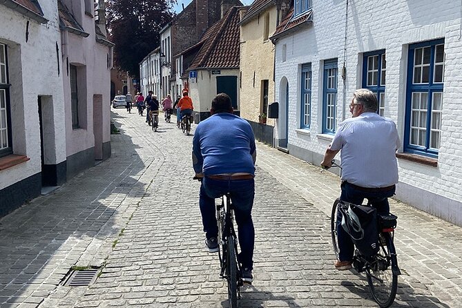 Bruges, Guided Retro Biketour: Highlights and Hidden Gems - Jan Van Eyckplein and Hof Bladelin