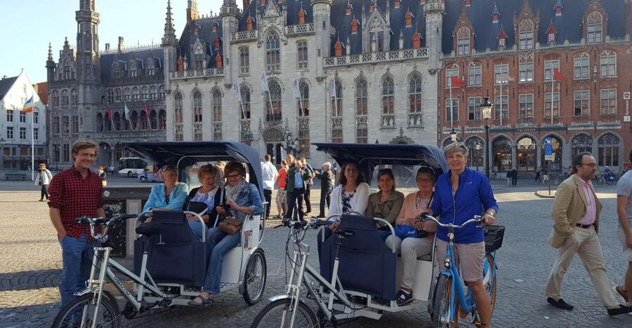 Bruges: Guided Rickshaw Tour - From famous sights to quieter streets