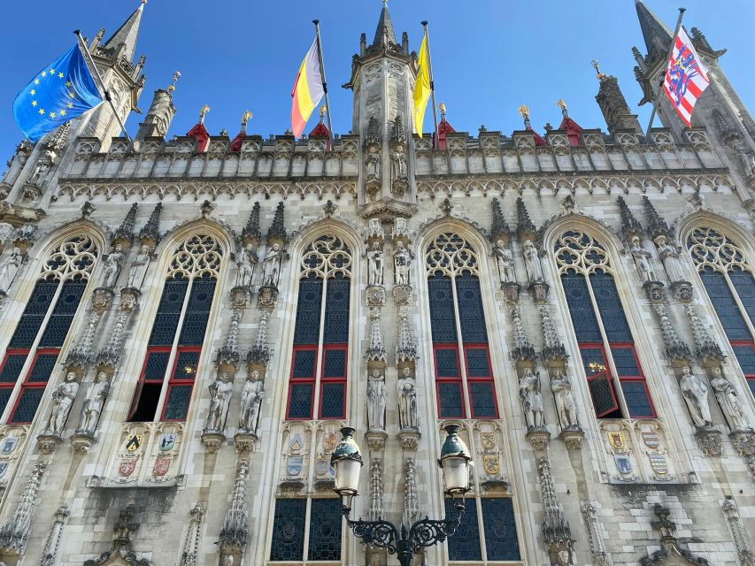 Bruges Guided Walking Tour: Stories, Mysteries and People - Canals, bridges, and Bruges’ postcard center