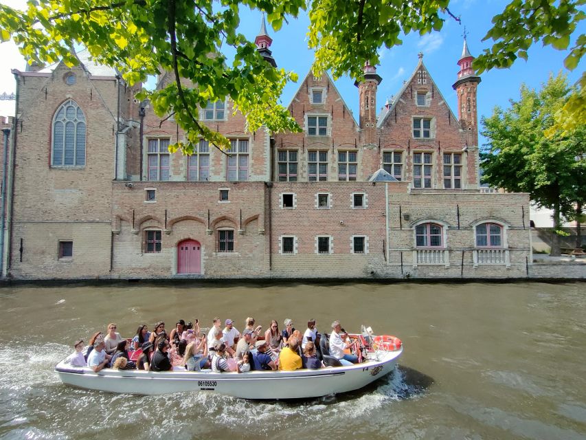Bruges: Small Group Boat Cruise and Guided Walking Tour - A brewery, an almshouse garden, and the Beguinage