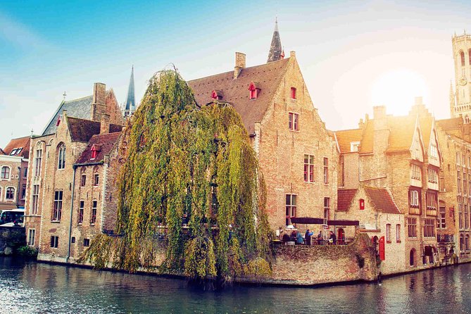 Bruges Uncovered: Historic Walking Tour & Canal Boat Experience - Burg Square explains Bruges’ civic power