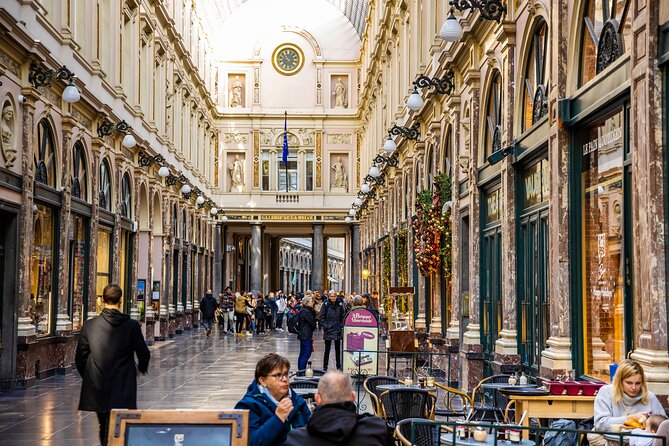 Brussels: City Walk with Audioguide in 7 Languages on your Phone - Manneken Pis and Brussels humor
