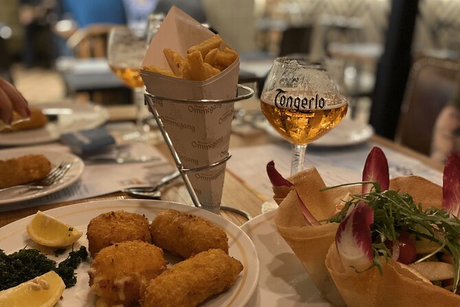 Brussels Food Tour: 10 Tastings of Waffles, Beers, Fries & More - Grand Place and the Ommegang connection