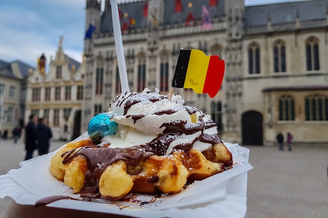 Brussels Walking Tour with Waffle Tasting: History and Delights - Grand Place and the story behind its gold-covered facades