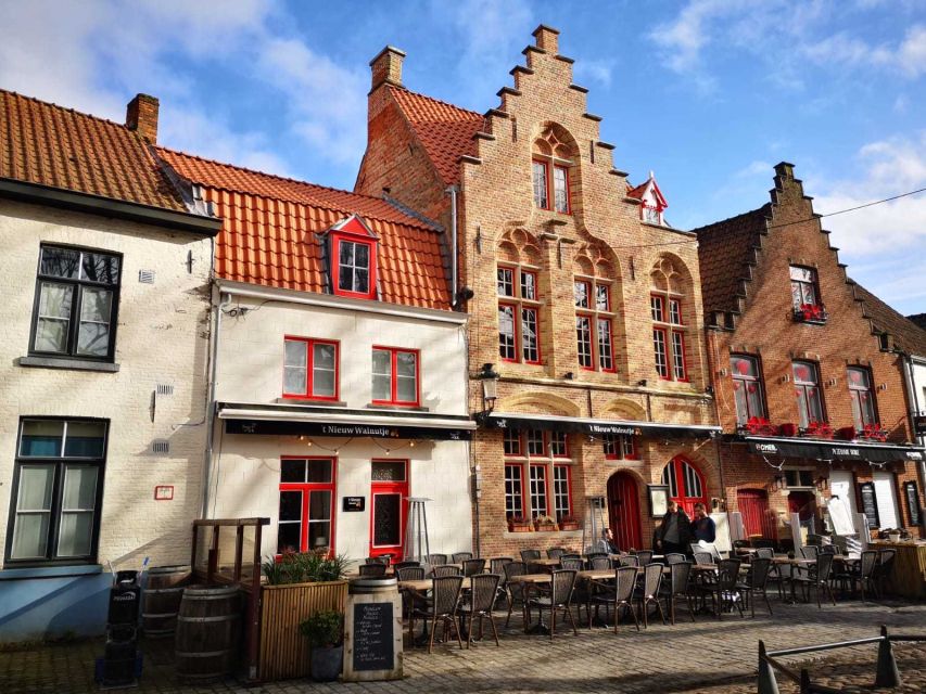 From Amsterdam: Bruges Day Trip in Spanish with Boat Option - Leaving Amsterdam by bus