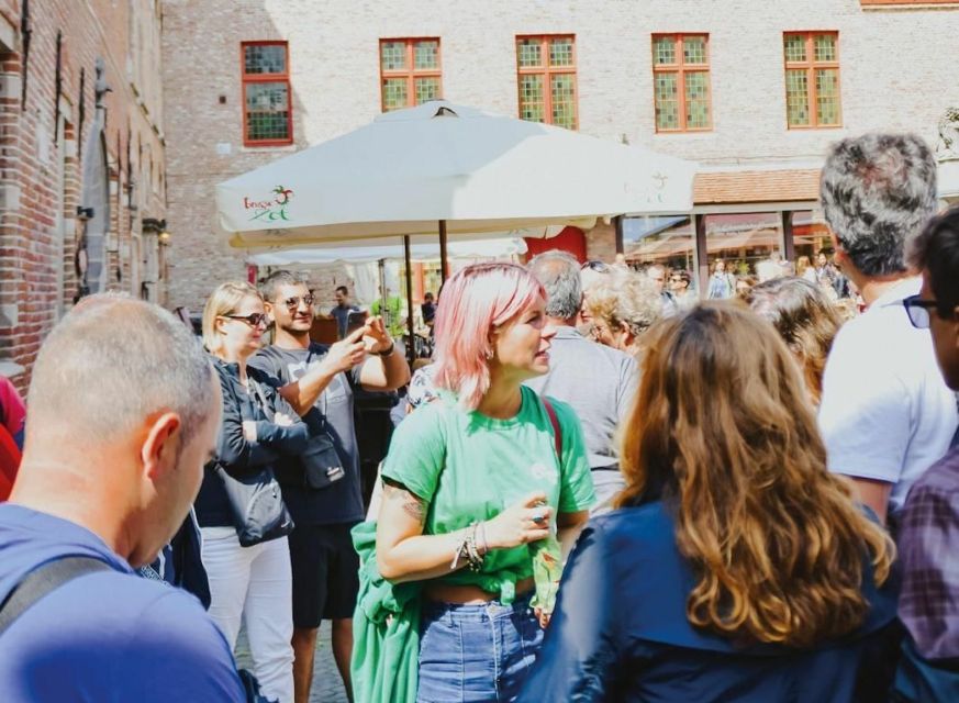 From Amsterdam: Day Trip to Bruges in Spanish or English - Group size, coach comfort, and the long return