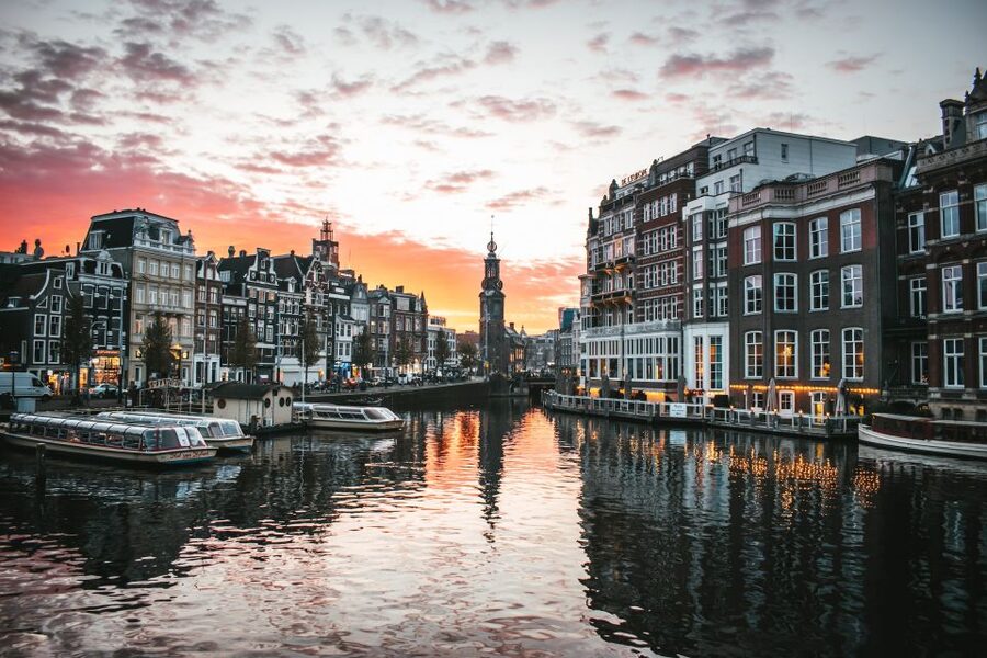 From Brussels: Cheese, Clogs & Windmills Amsterdam Day Trip - A windmill photo stop with a twist