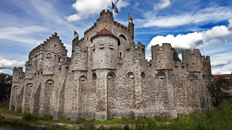 From Brussels: Full-Day Antwerp and Ghent Guided Tour - Antwerp begins with medieval streets and grand churches