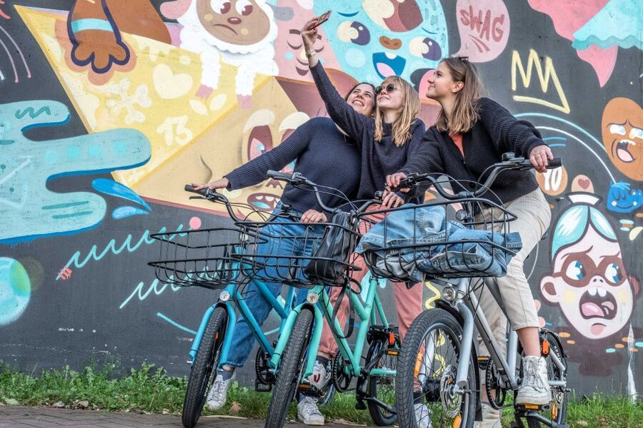 Ghent: City Highlights and Hidden Gems Guided Bike Tour - Portus Ganda and the city shaped by water