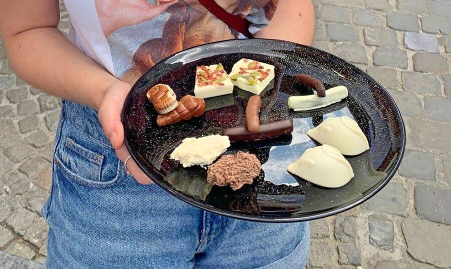 Ghent: Guided City Tour with Food Tastings - Starting at Vrijdagmarkt with a taste of local life