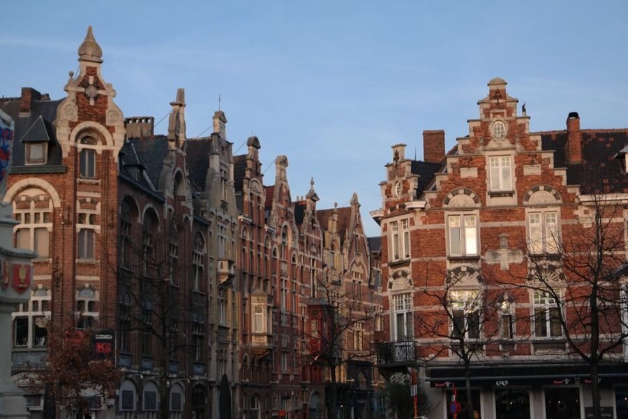 Ghent: Walking Tour from Friday Market to the Cathedral - The coach tour from Millionaires’ Quarter to St. Peter’s Square