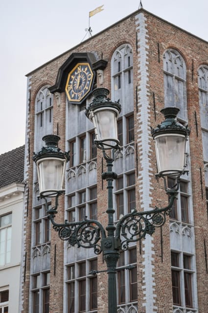 Historical walk in Bruges with local guide. Praline included - Gruuthuyse Castle, the Church of Our Lady, and the Dijver canal