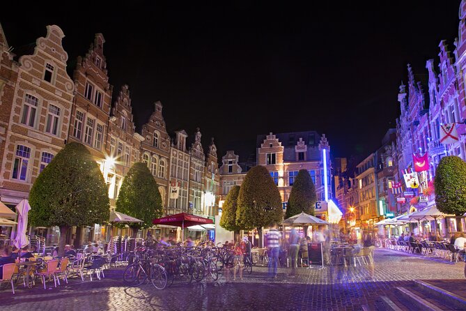Leuven: City Walk with Audio Guide in 7 Languages on your Phone - Leuven Town Hall and its crowded facade