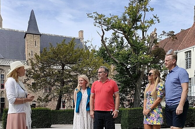 Private tour: From your hotel + see the Madonna of Michelangelo - A fast start at the 83-meter Belfort