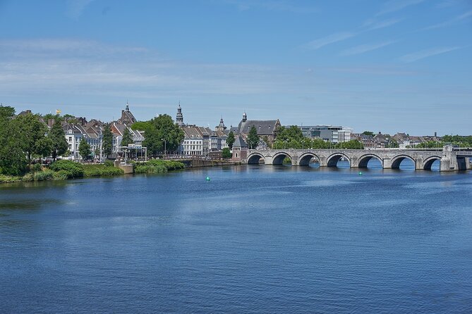 Small Group Liège to Aachen to Maastricht Border Crossing Tour - A short riverside pause at Parc de la Boverie